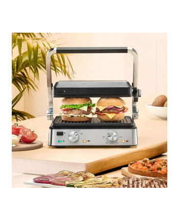 Braun Multigrill 7 CG7020 czarny/inox Grill kontaktowy| Moc [w]: 2000 | Kolor: czarny/inox | płytki: 1 grillowa, 1 płaska | Wymiary [wys.x gł.x szer. cm]: 36,5x31,5x17,3